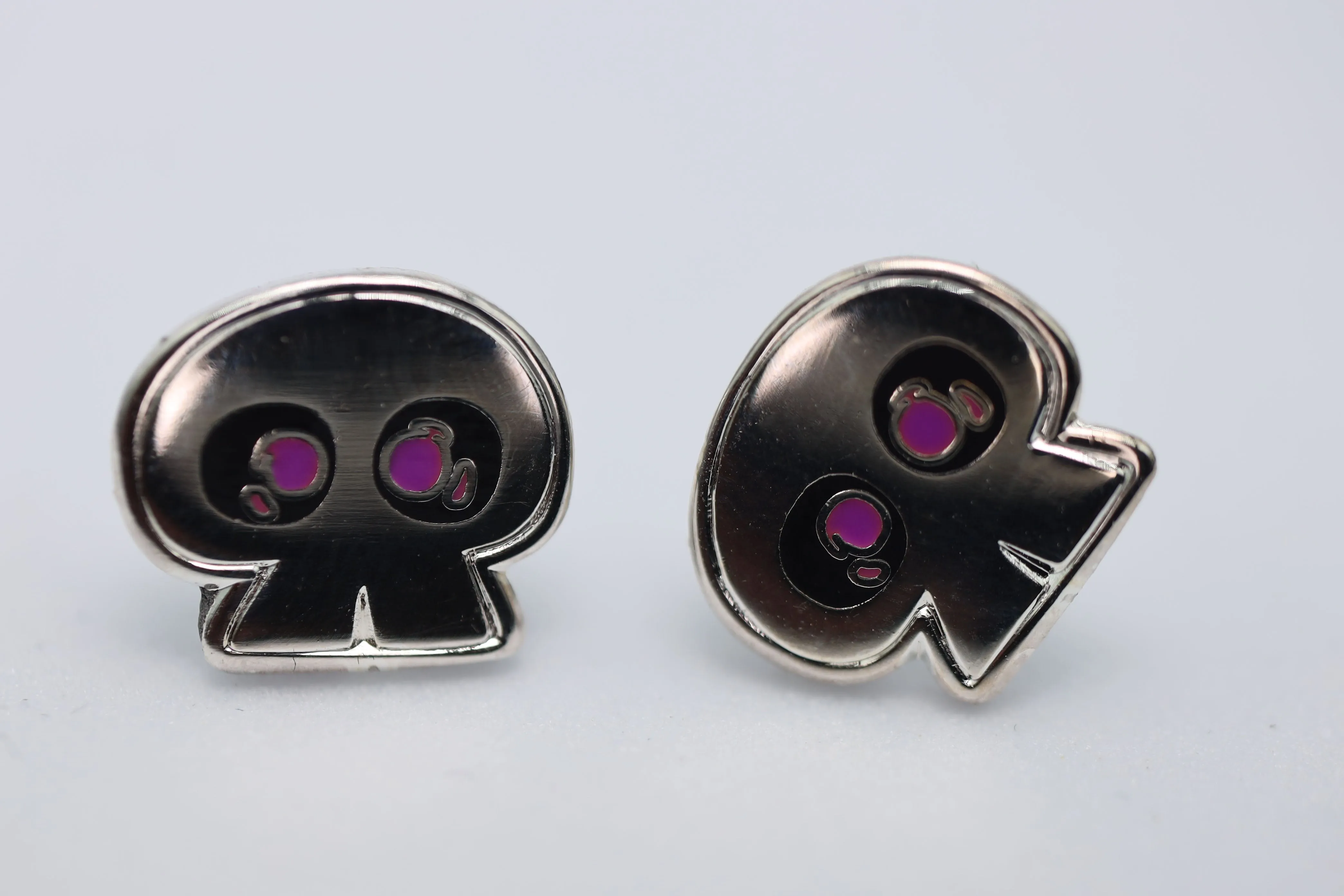 Acquisitions Inc Stud Earrings: Jim Darkmagic Brooch