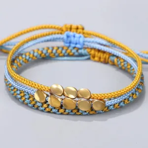 Celestial Weave: Tibetan Copper Bead & Rope Bracelets