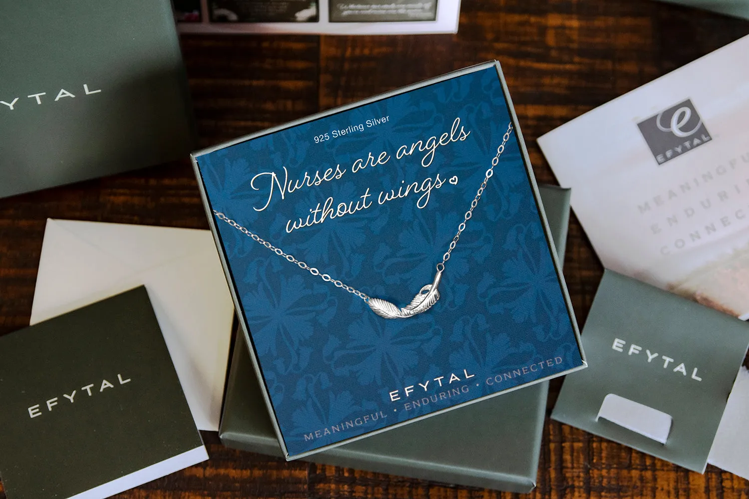constance feather necklace, silver or gold • nurses are angels