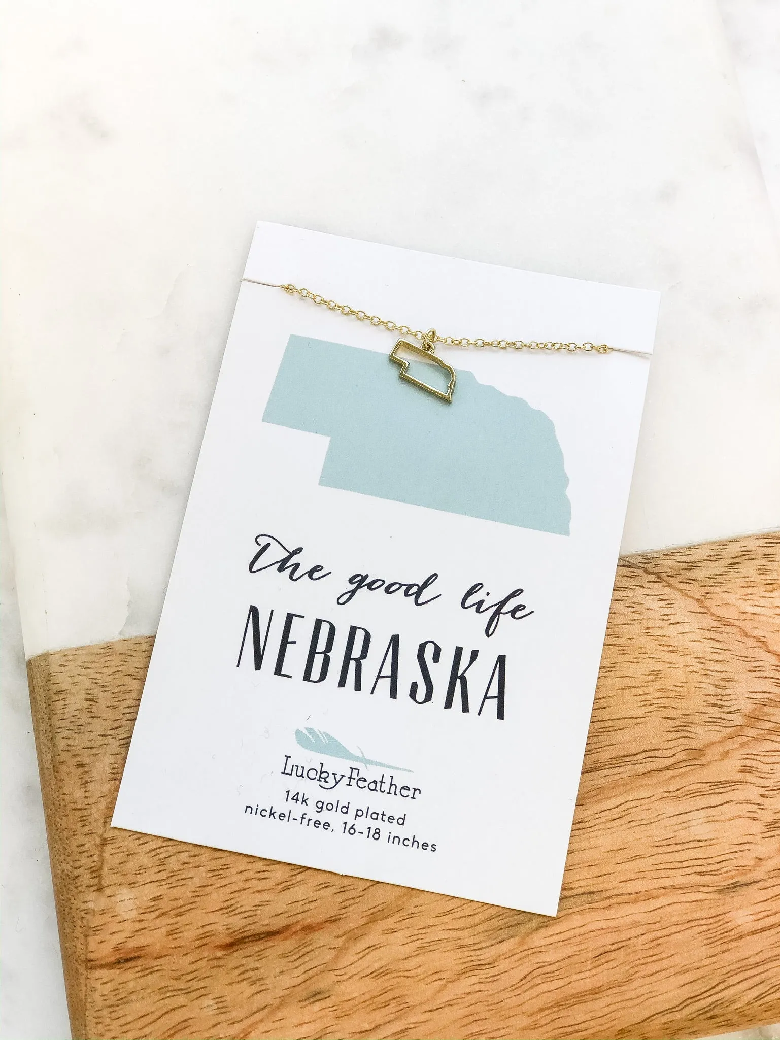 Petite State Outline Pendant Necklaces by Lucky Feather - Nebraska