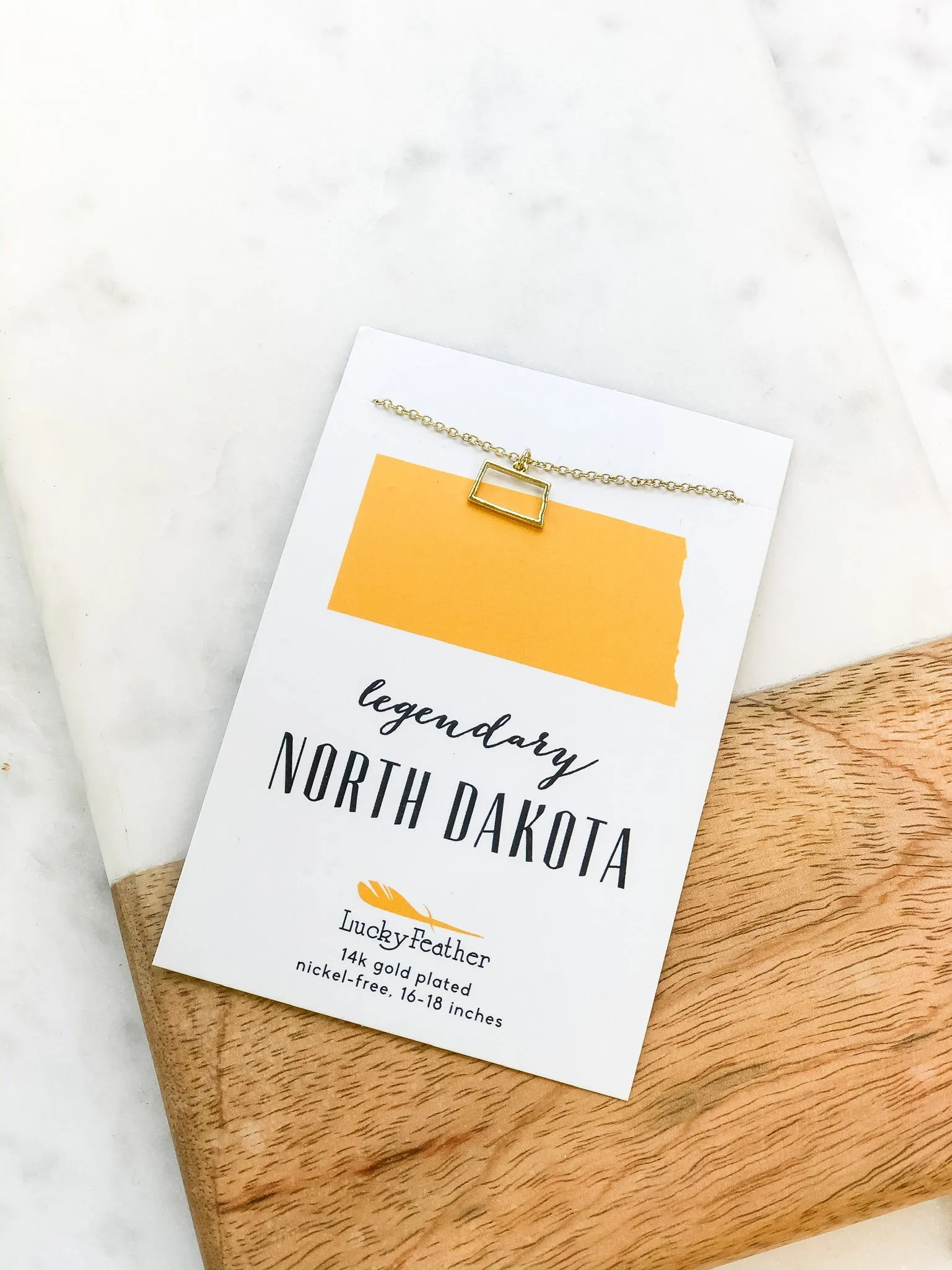 Petite State Outline Pendant Necklaces by Lucky Feather - North Dakota