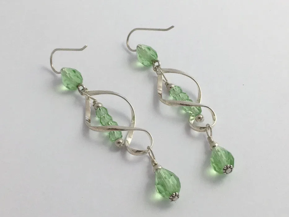 Sterling Silver long open twist drop Earrings- Celtic Knot, light green crystal