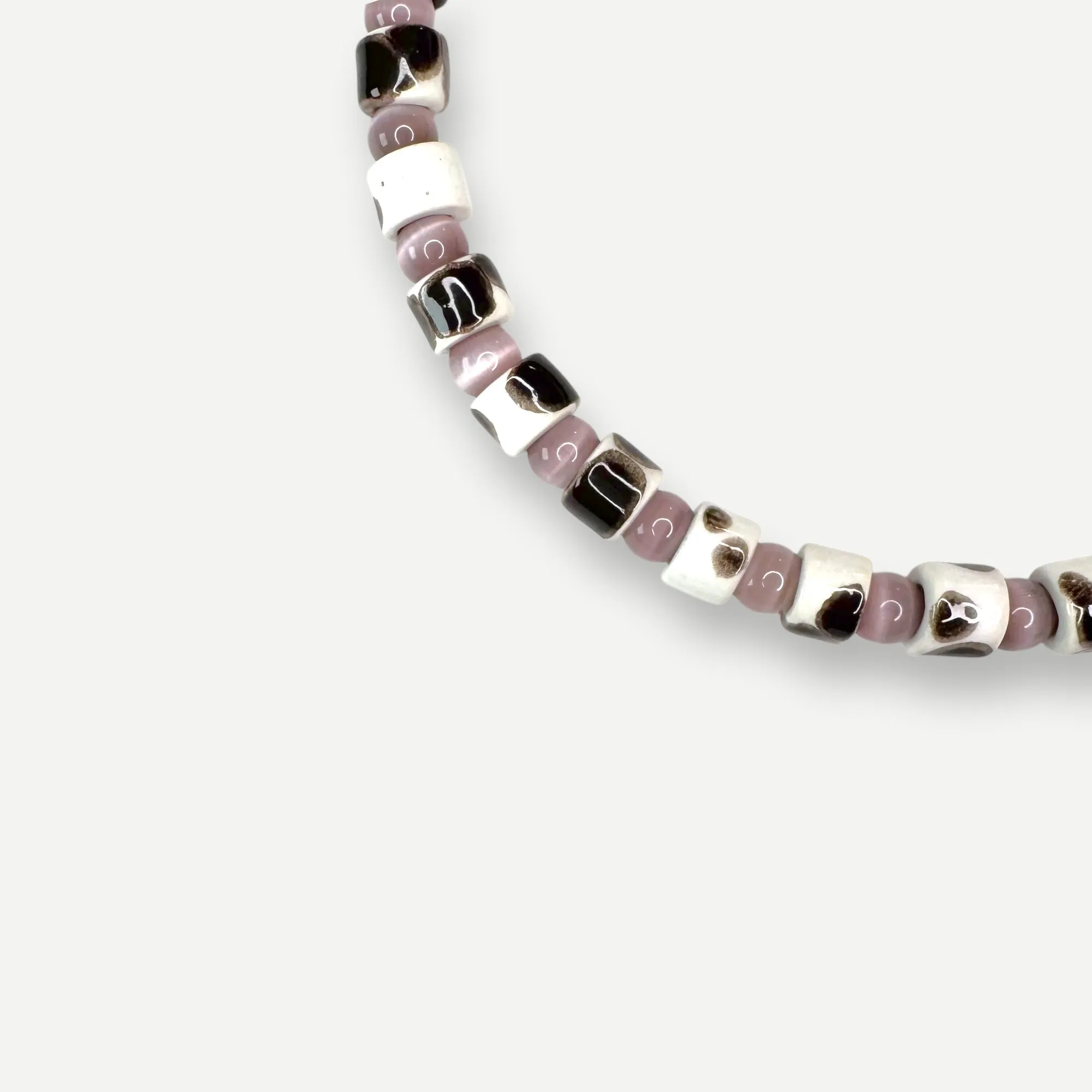 TOR & CAT EYE SUNDRY.  BEAD ONE.