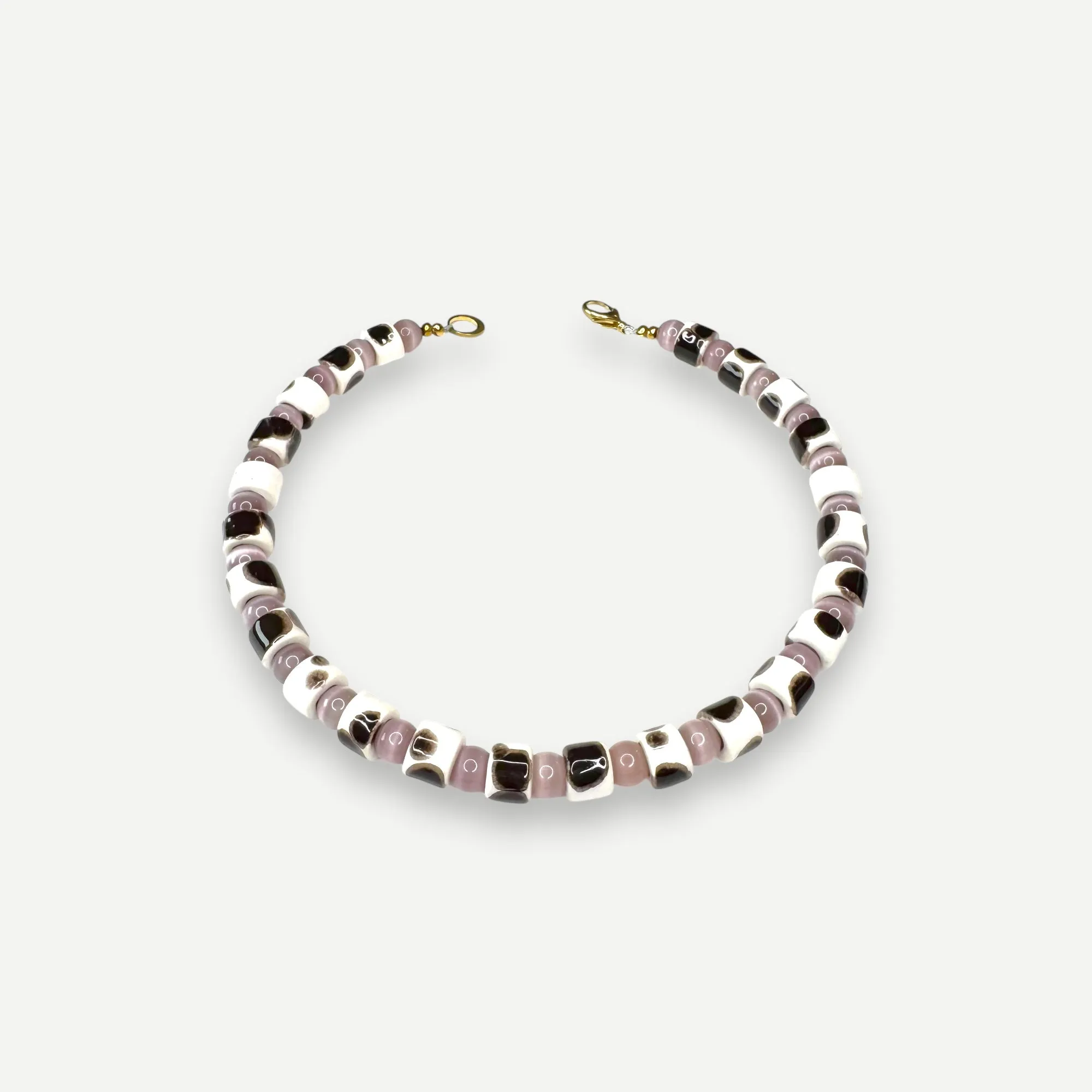 TOR & CAT EYE SUNDRY.  BEAD ONE.