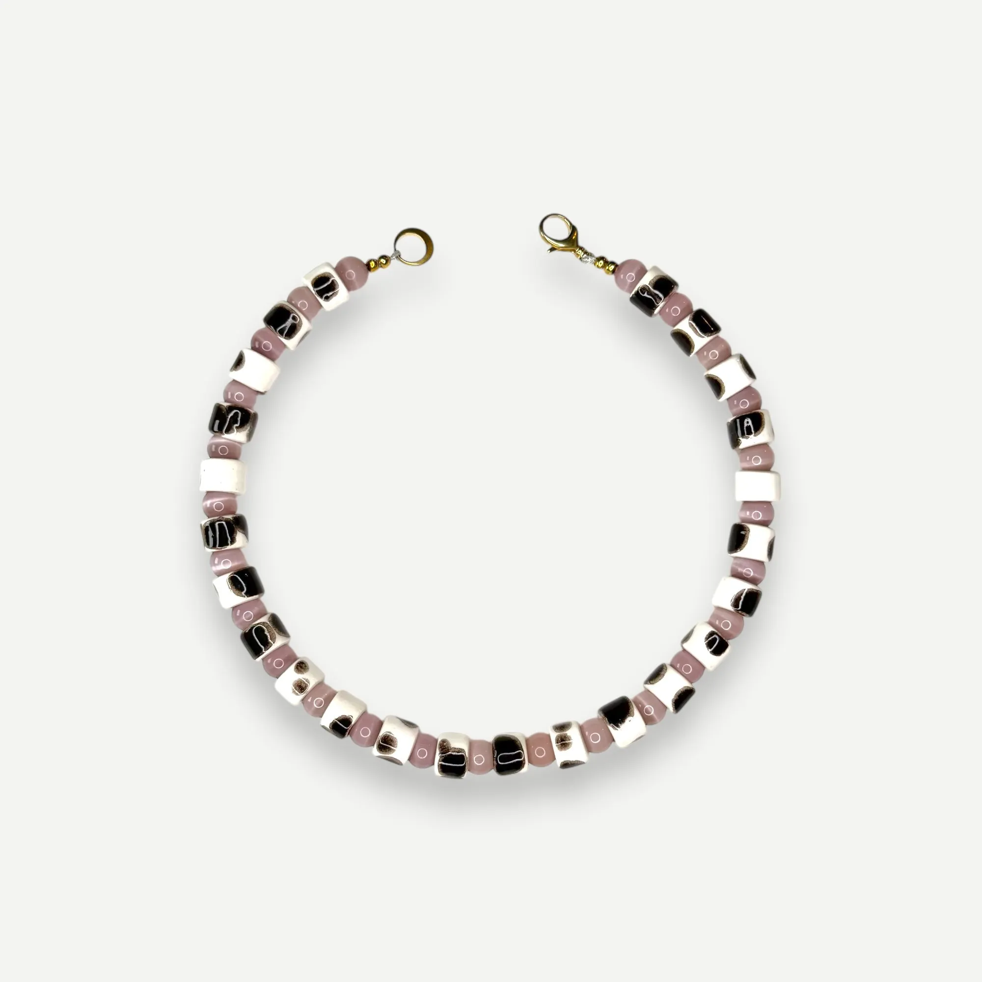 TOR & CAT EYE SUNDRY.  BEAD ONE.